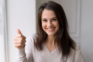 About Us woman showing ok sign 23 2148990150 300x200 1